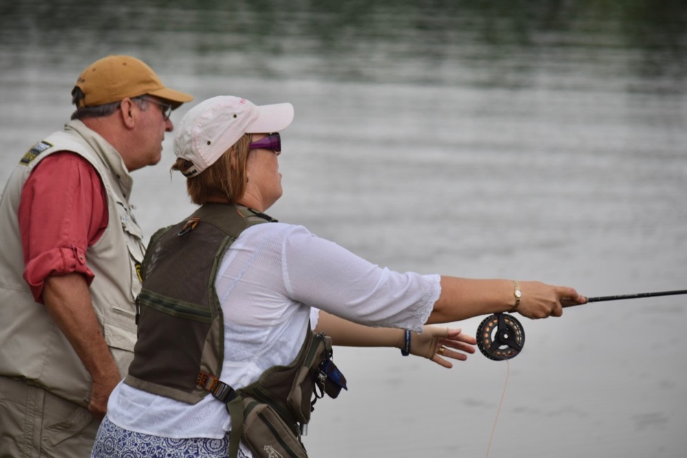 Older couple flyfishing 