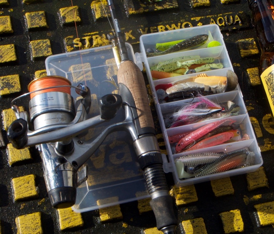 various modern takle laid out on the ground