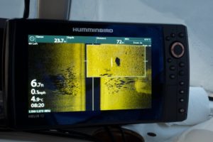 a screen showing sonar live on a lake